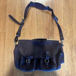 Brown leather messenger bag. Brand is Breton from Marlow and Sons.